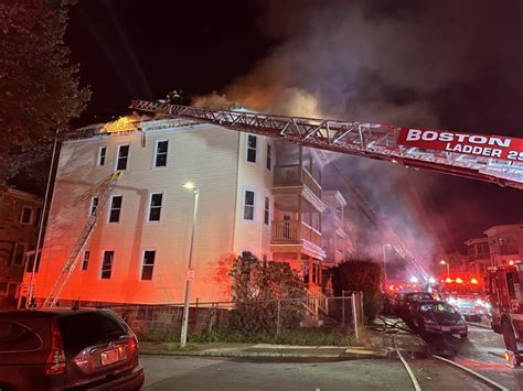 Boston firefighter injured in Mattapan blaze, 13 residents displaced after fire spread from vacant building